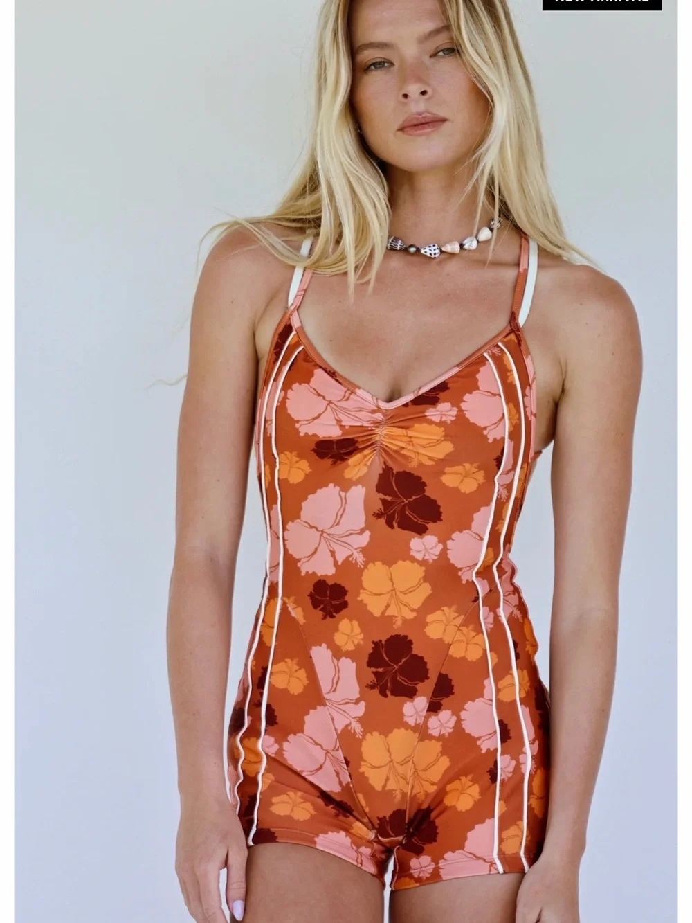 Strait. The Label. One piece hibiscus romper